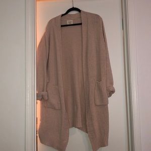 Cream colored cardigan. Never worn